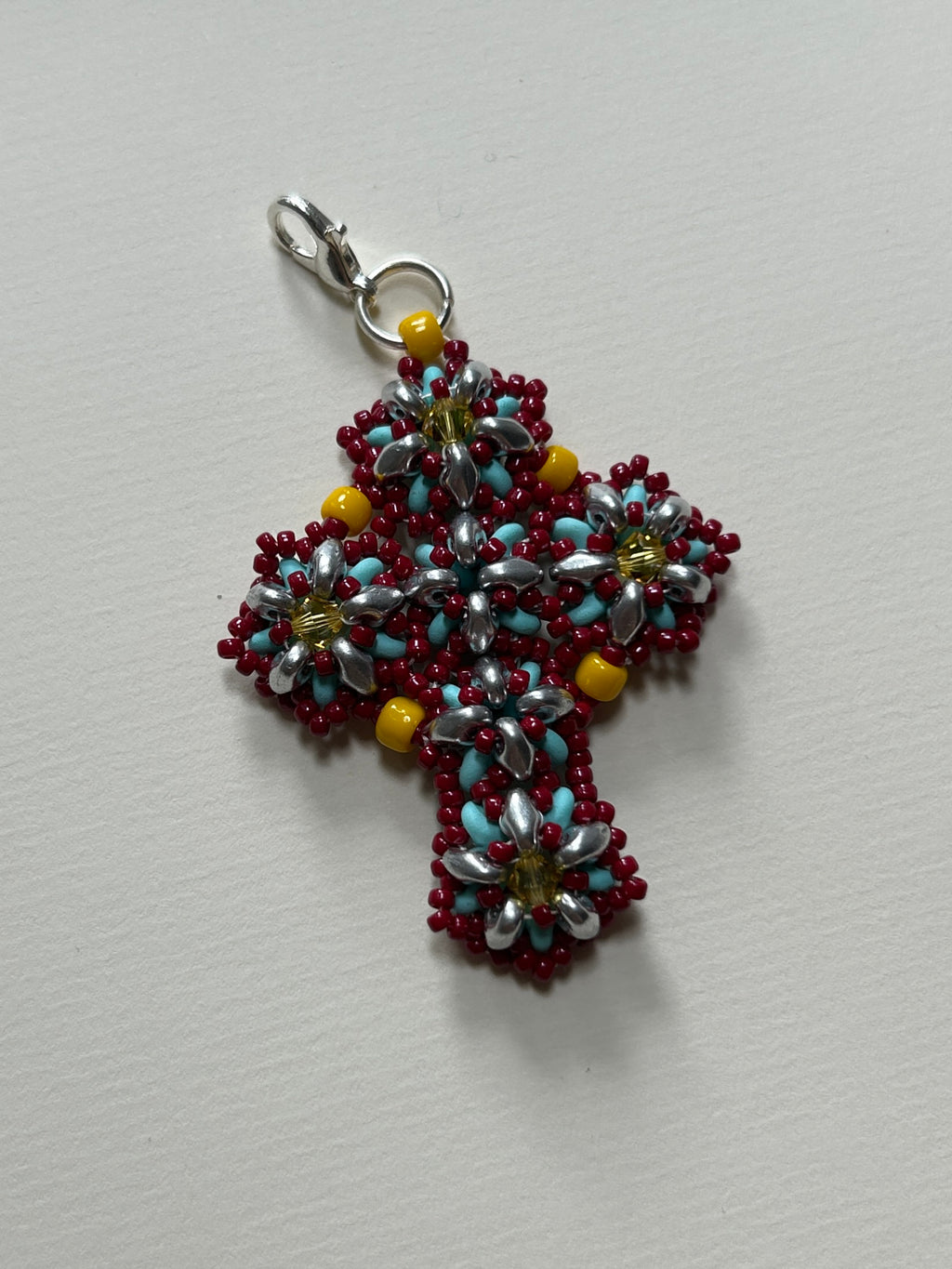 cross pendant - red, light blue, yellow