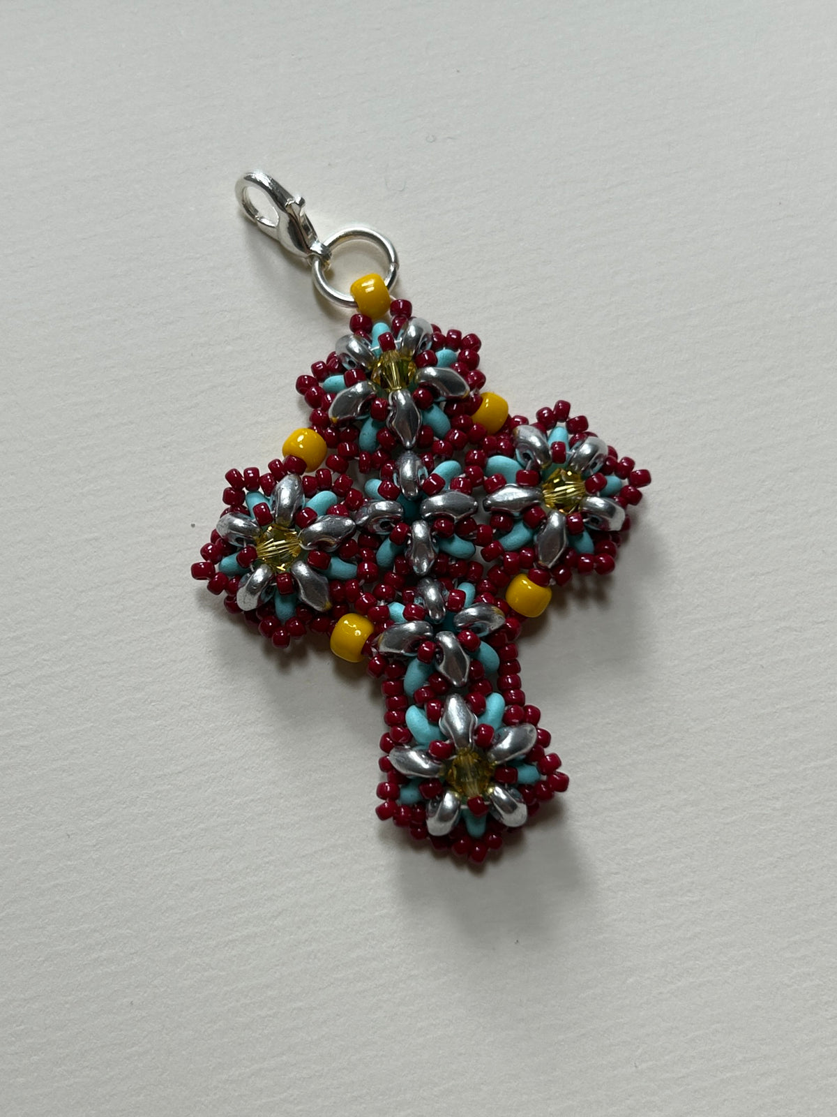 cross pendant - red, light blue, yellow